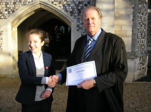 An image of Alice Hare collecting her prize